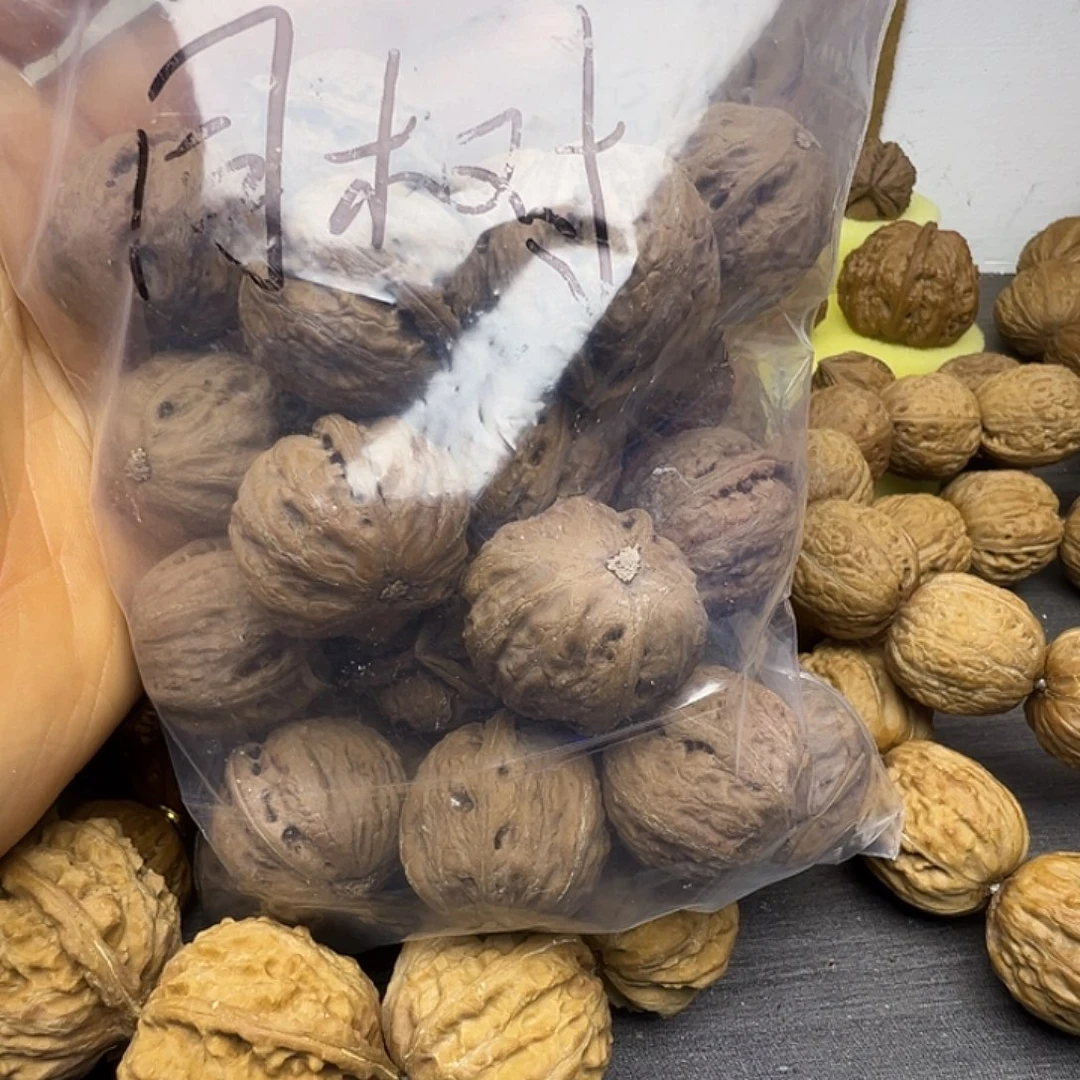 玩***恭猴头核桃吊坠三棱打包