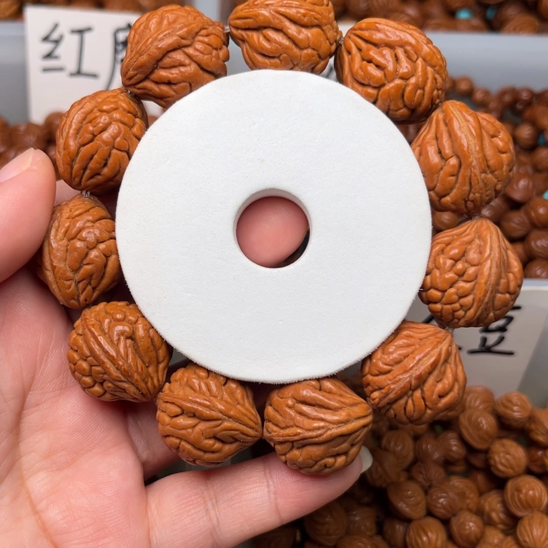 六***。桃核吊坠22左右霸王龙