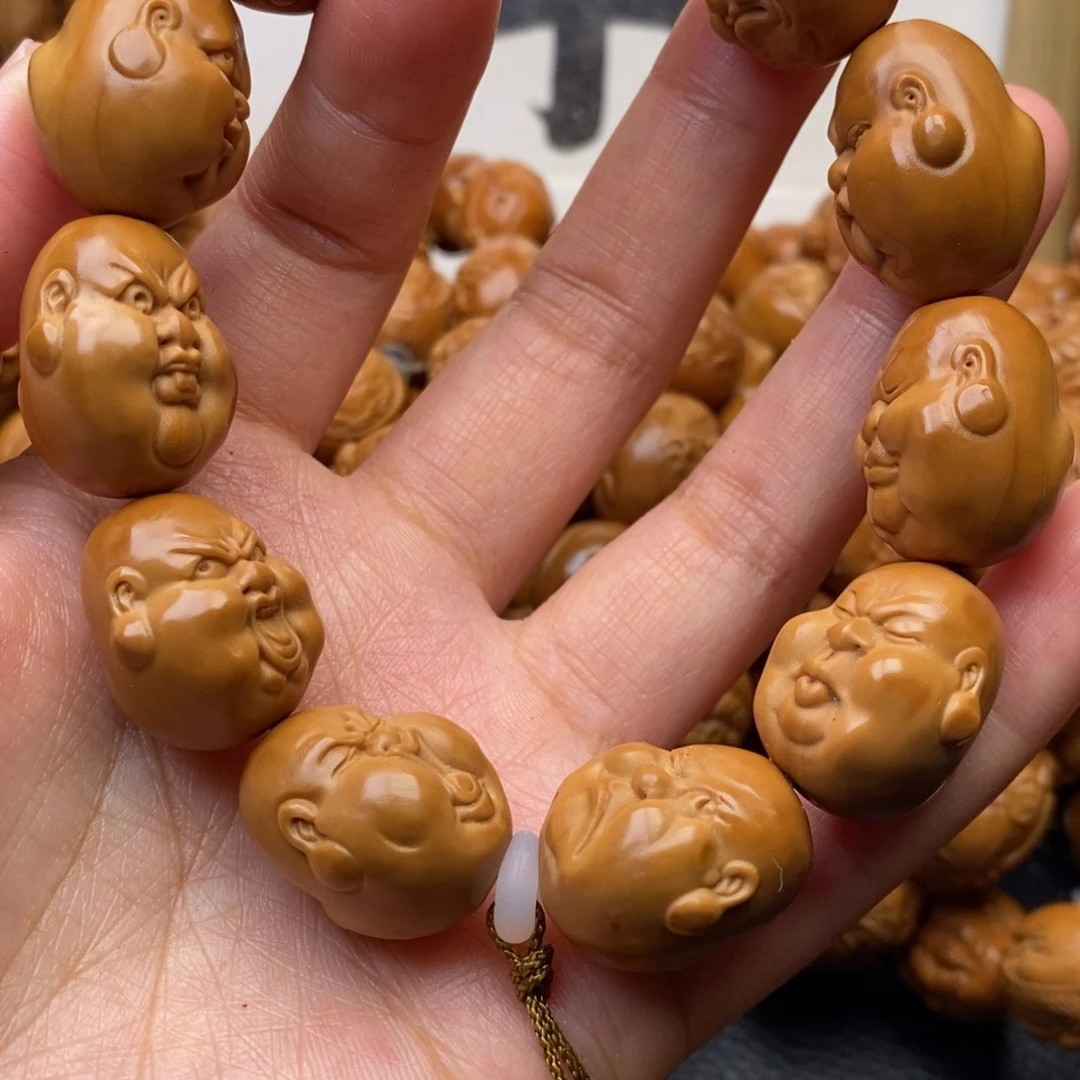 石***头手串橄榄核胖子百态