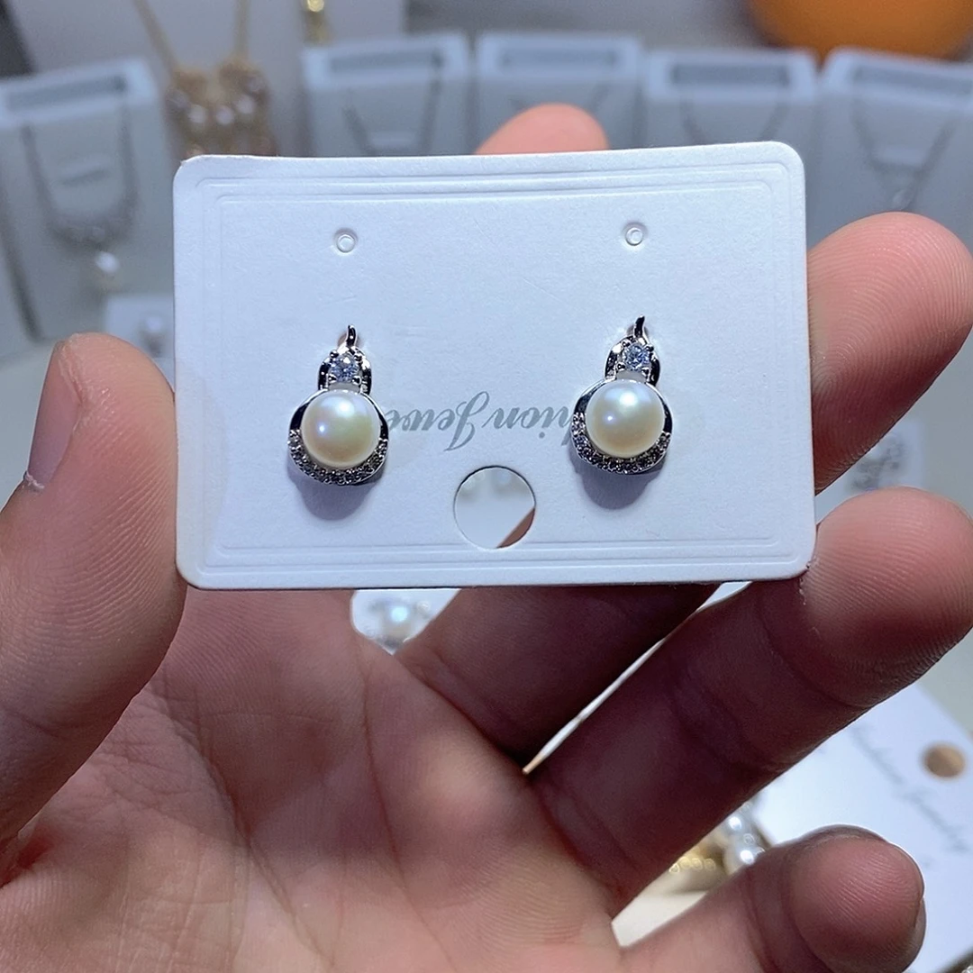淡水珍珠银S925镶嵌耳饰