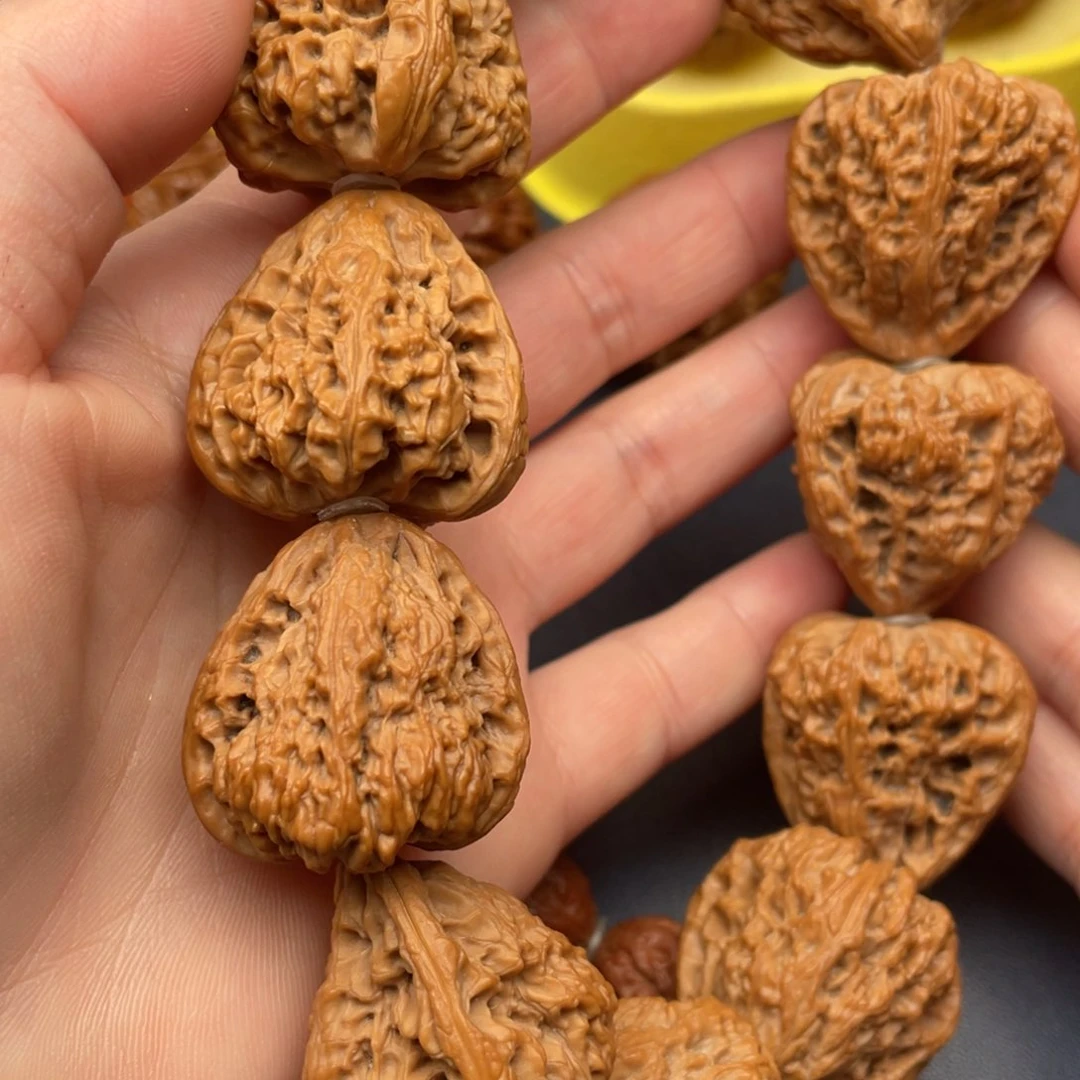 文玩核桃把件三角疆手持30