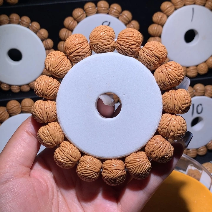 温***风桃核手串龙鳞凤尾