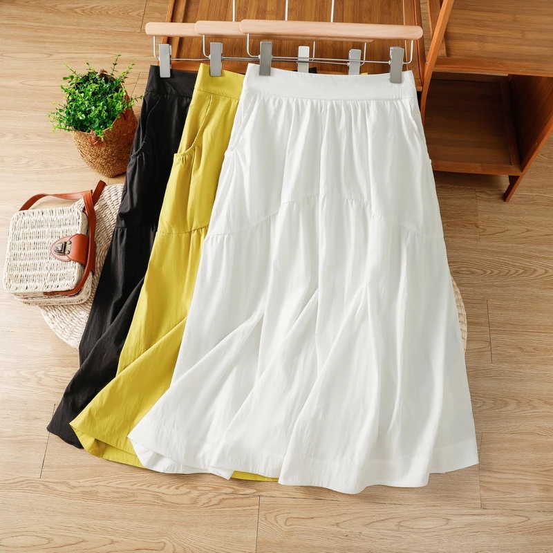 棉麻时尚混纺凉感A字型弧形分割纯色拼接口袋中长款松紧腰半身裙