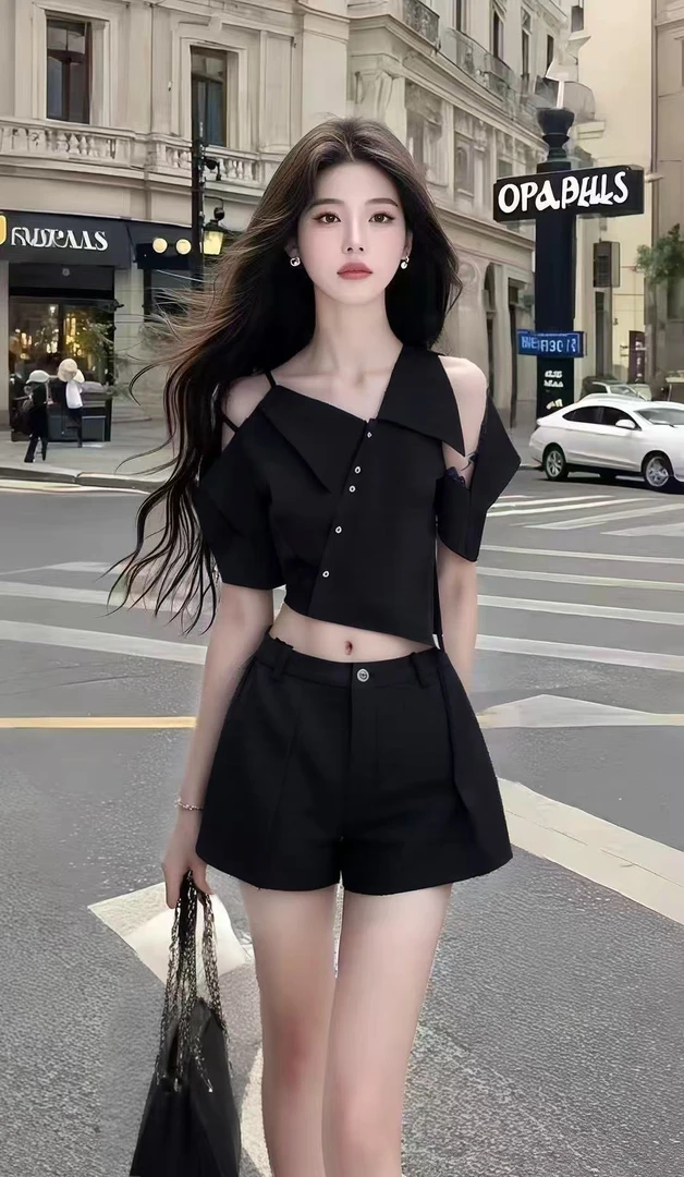 气质辣妹风黑色短袖不规则设计短款上衣+黑色百搭显瘦短裤两件套