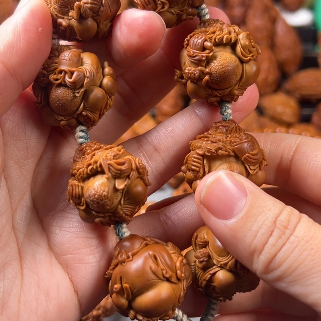柯***睿橄榄核手串/手链核雕