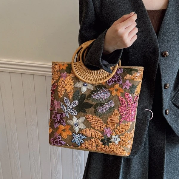 亮片草编托特包高级感小众刺绣女士包包大容量时尚编织化妆包