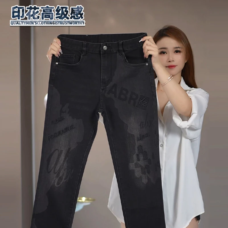 印花撞色牛仔裤男生高级感水洗设计感长裤子男秋冬季新款欧货商务