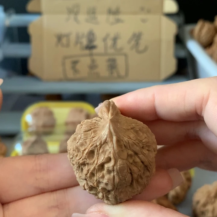 魔***天吊坠文玩核桃异形单只，有瑕疵