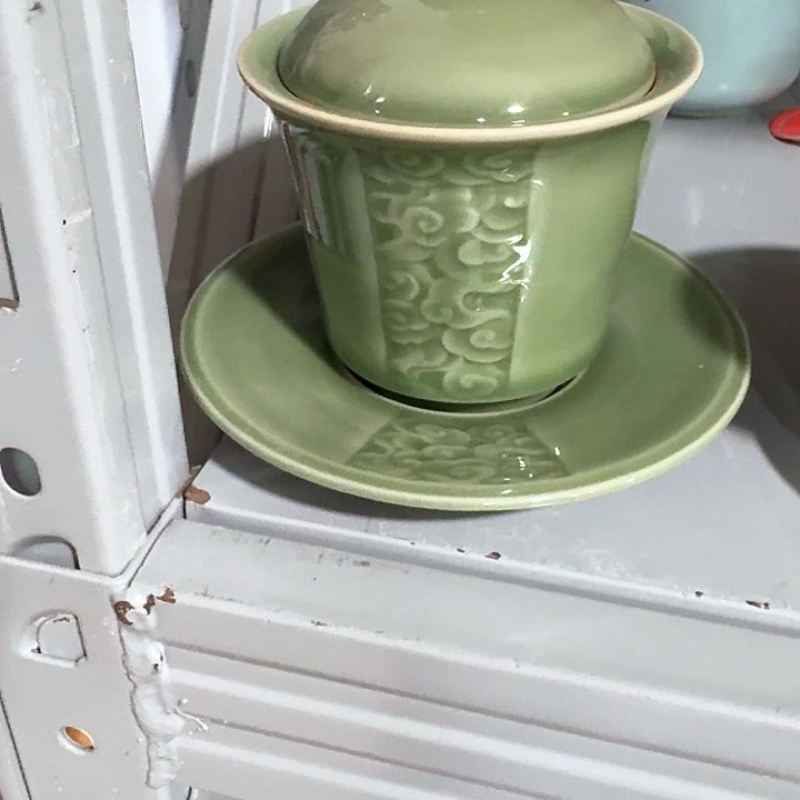 主人杯一个，瓷。。品茗
