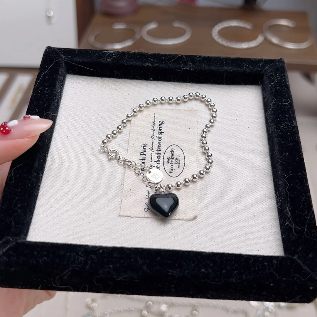 皮质925银黑色爱心手链