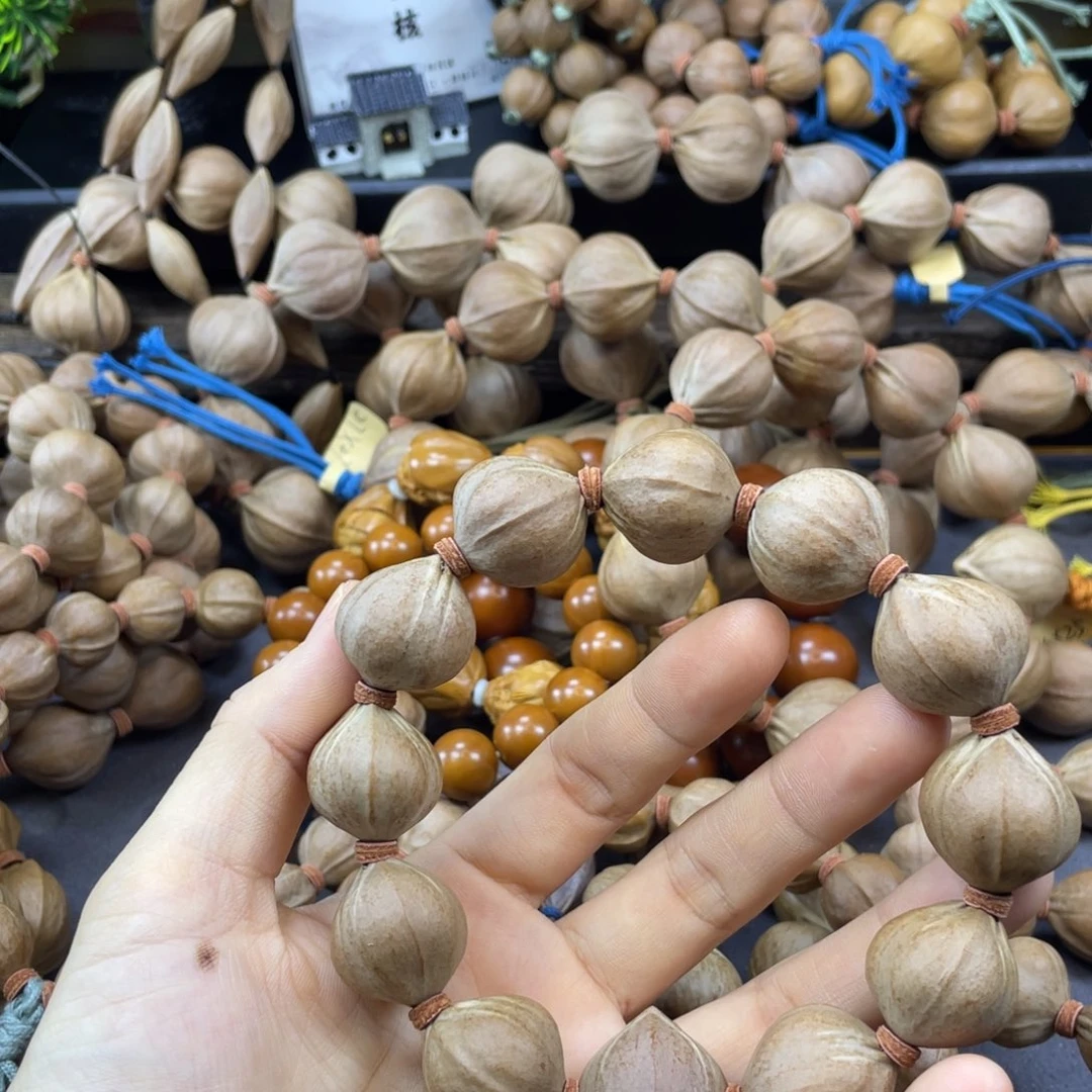 饕***8橄榄核吊坠22x23老