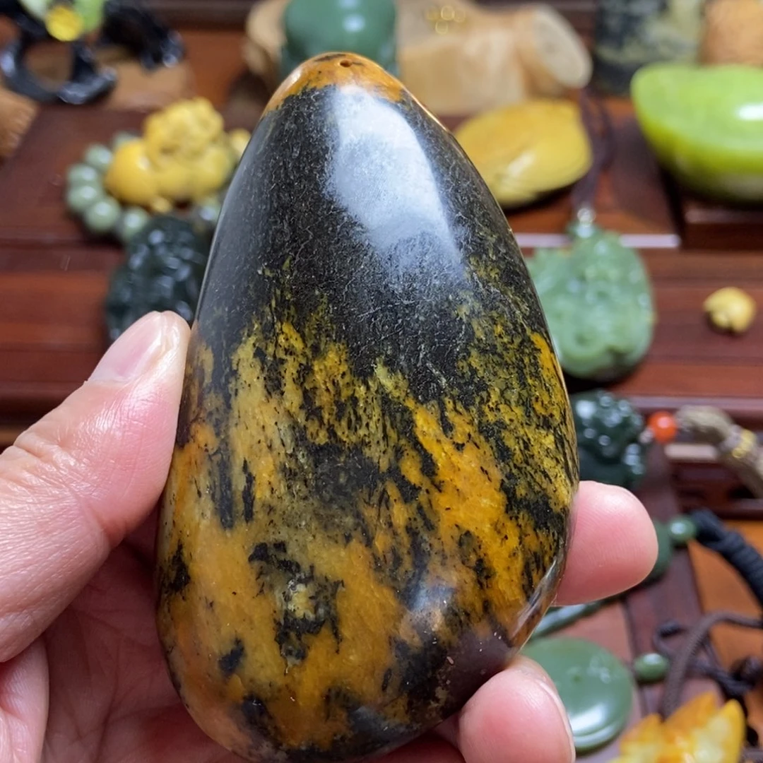 蛇纹石玉手把件未镶嵌