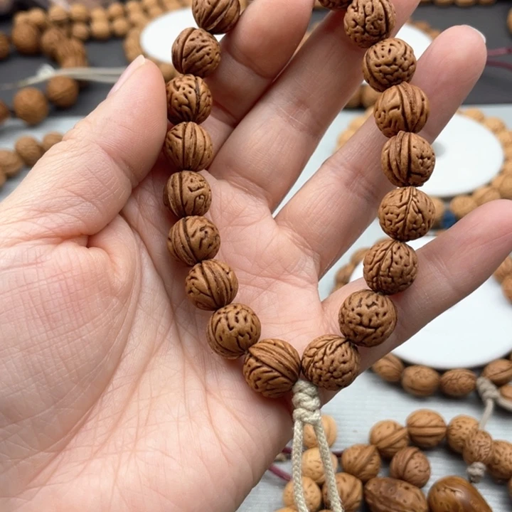 _****_11.8尺寸野生桃核手持（福利款不退不换）