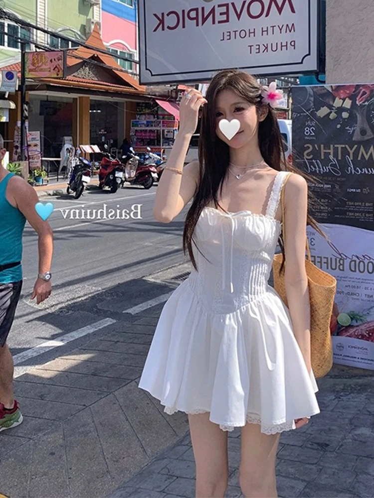 法式少女束腰吊带连衣裙女收腰显瘦白色度假初恋短裙子夏季穿搭