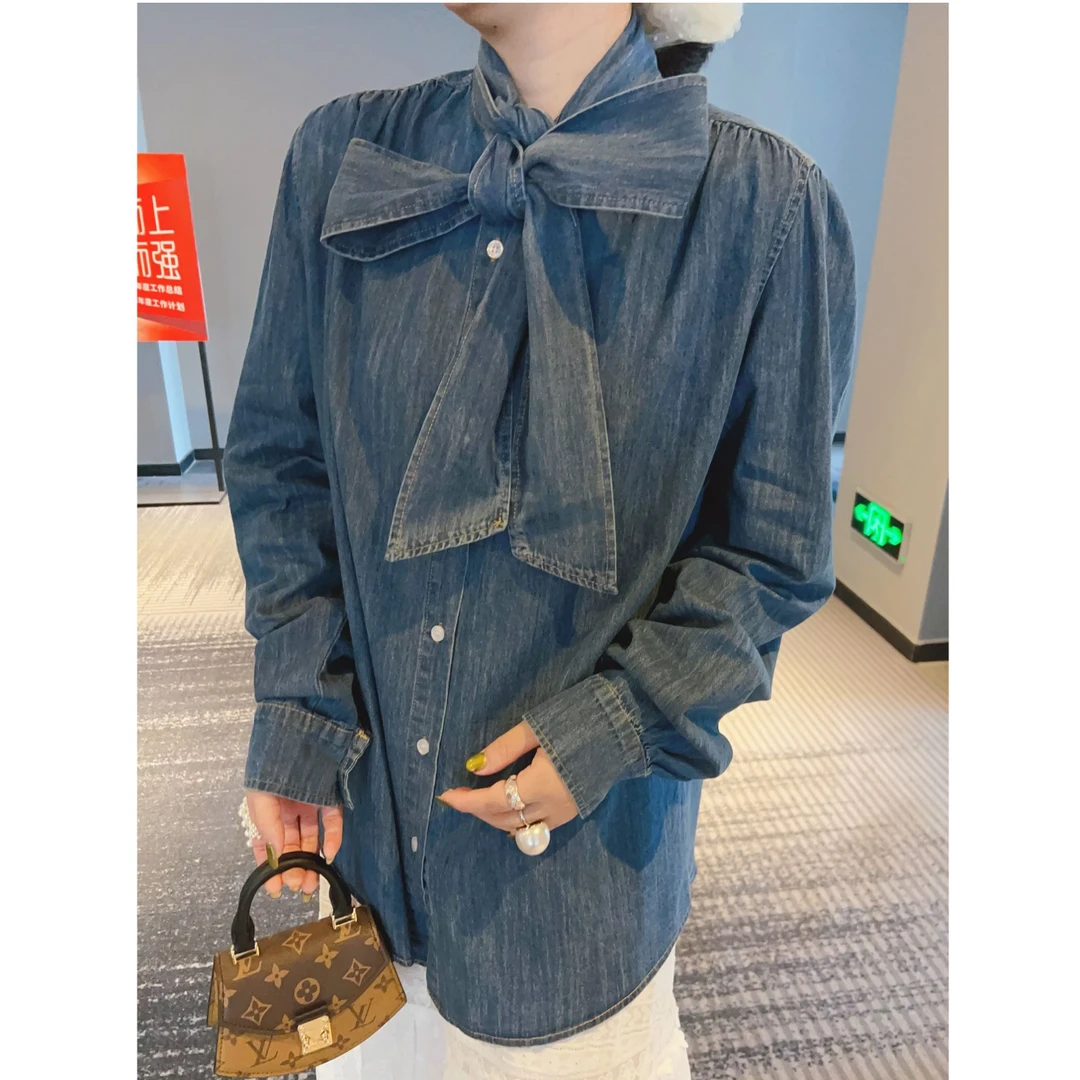 独特好看蝴蝶结牛仔外套女春秋季爆款复古小众东大门宽松显瘦衬衫