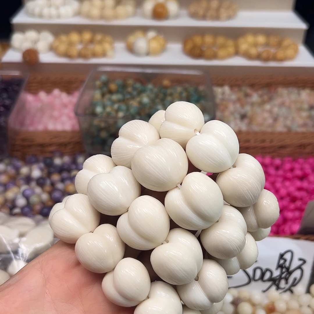手串菩提根/象牙果瑕疵白拉丝屁桃1条表面孔道有裂