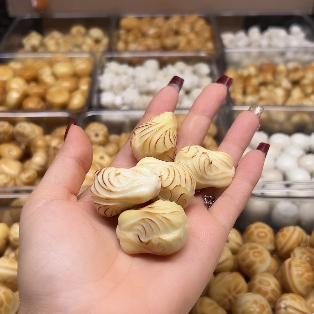乔***H菩提根/象牙果手串微瑕炭烤大白菜5颗有裂