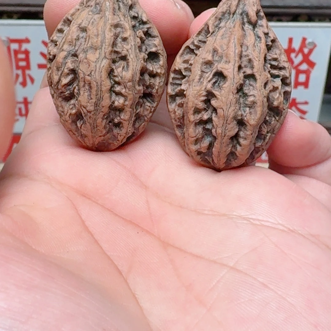 文玩核桃吊坠石中剑