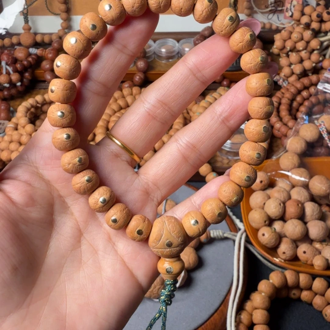 把件凤眼菩提精工藏式，镶嵌铜钉27颗手持