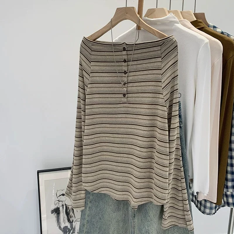 韩系穿搭巨好看高级感一字肩露肩长袖T恤女早秋2025新款条纹上衣