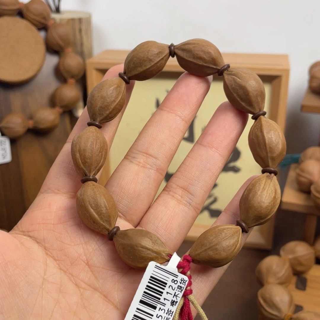 展***来橄榄核手串/手链15*24梅林铁核
