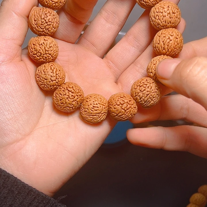 梦***开吊坠桃核桃核手串
