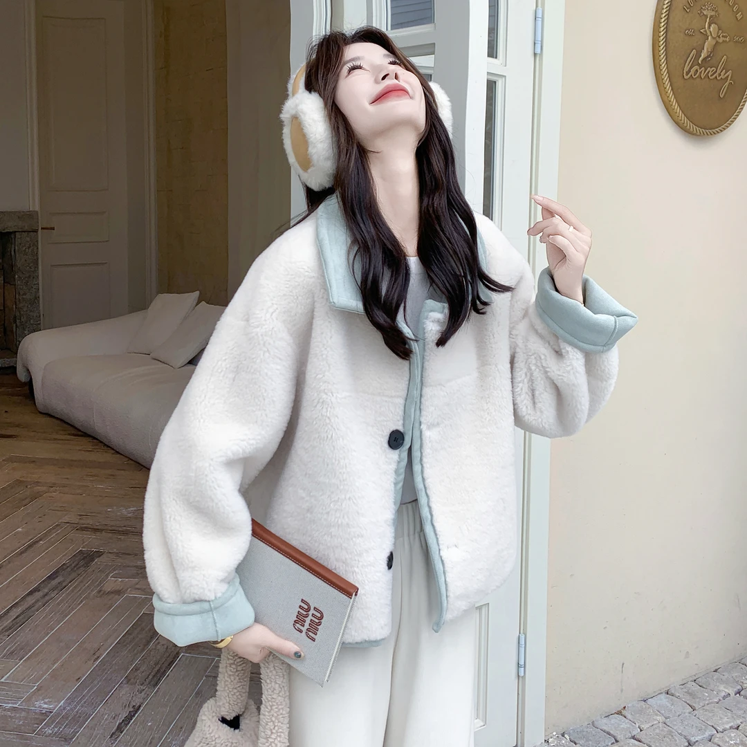 蓝色双面穿羊羔毛外套女冬季2025新款设计感洋气保暖皮毛一体棉服