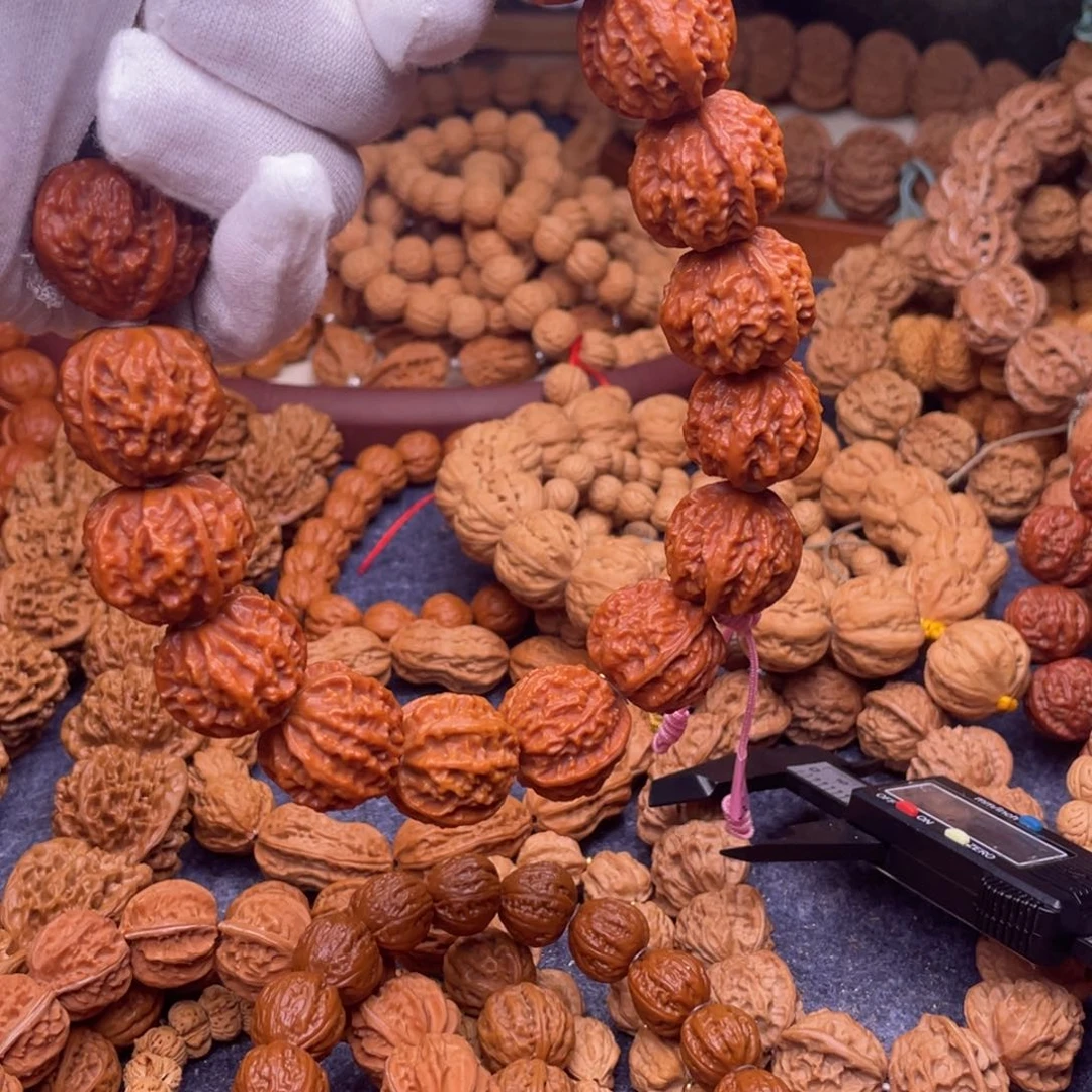 A***n文玩核桃手串秋子