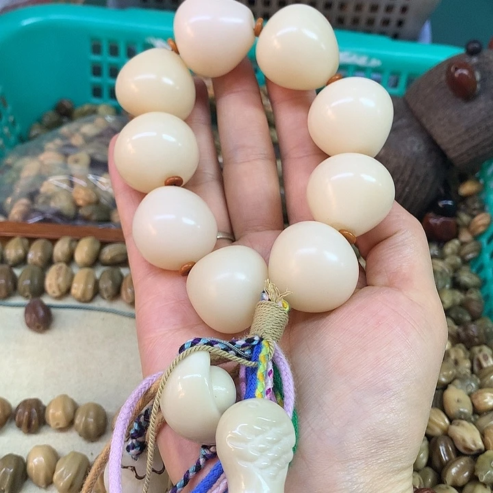 千眼菩提吊坠白色佛心果手持