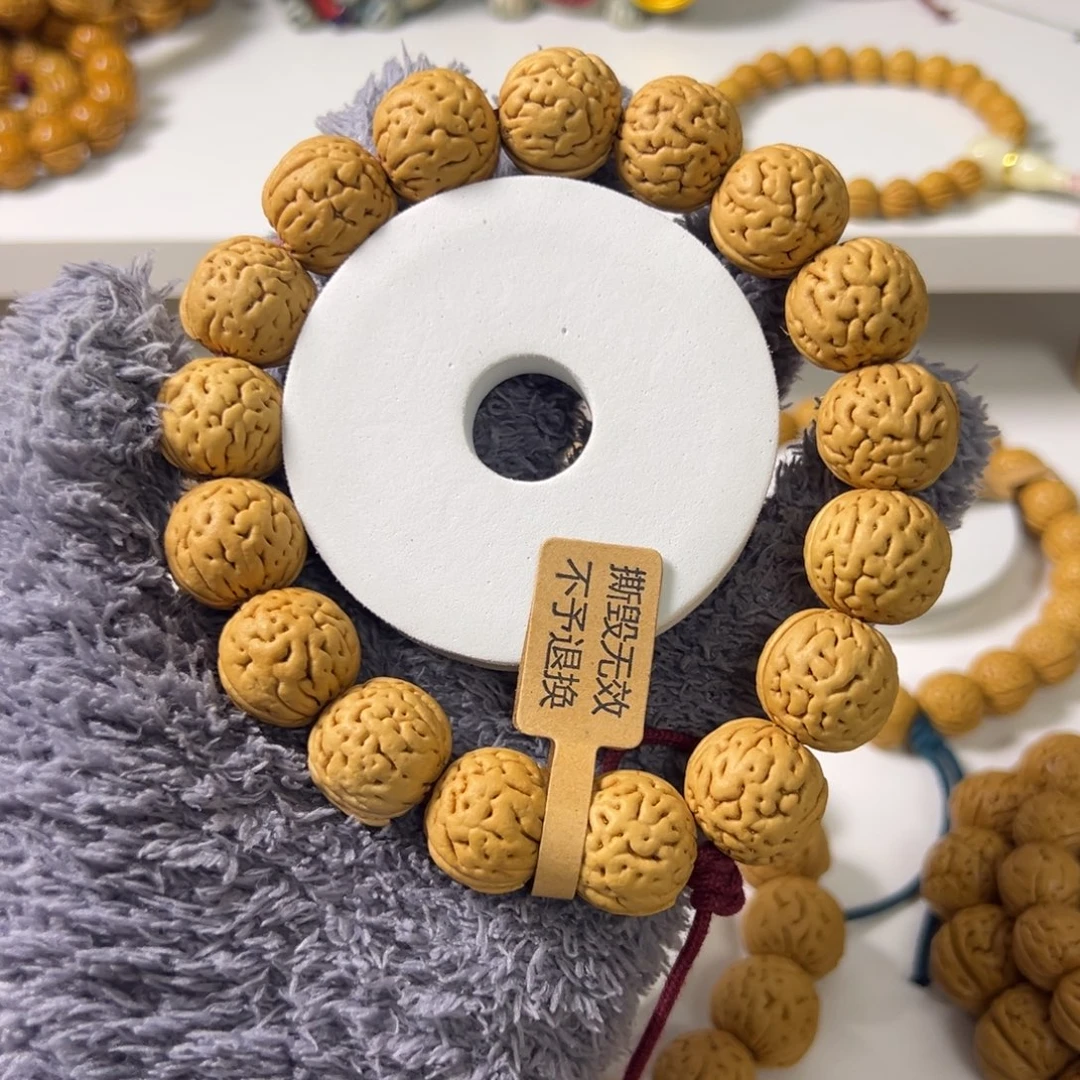 犟***手串桃核盘锦肌肉