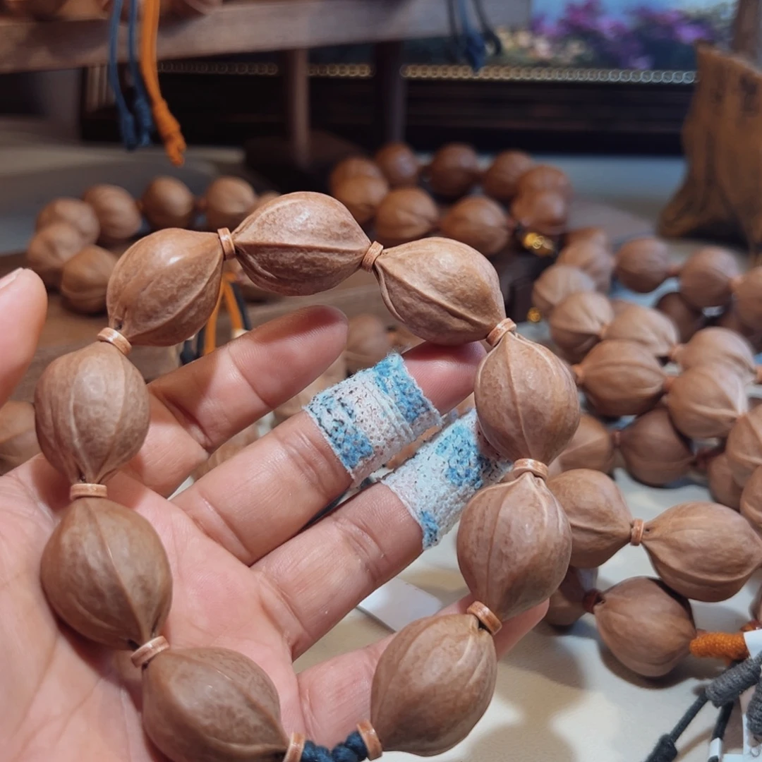 梅***爻手串橄榄核梅林铁核鲨鱼背素串 20×26