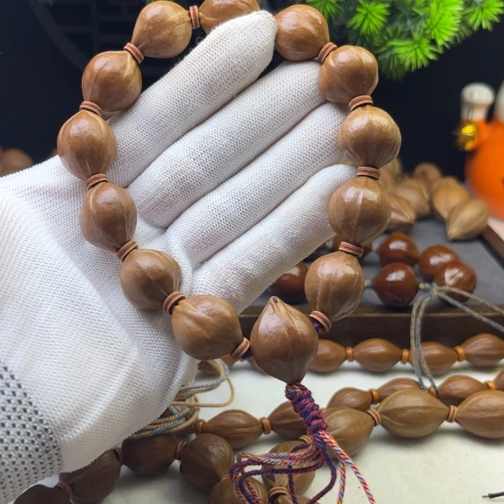 橄榄核手串/手链1.6*2.0原皮三花铁核