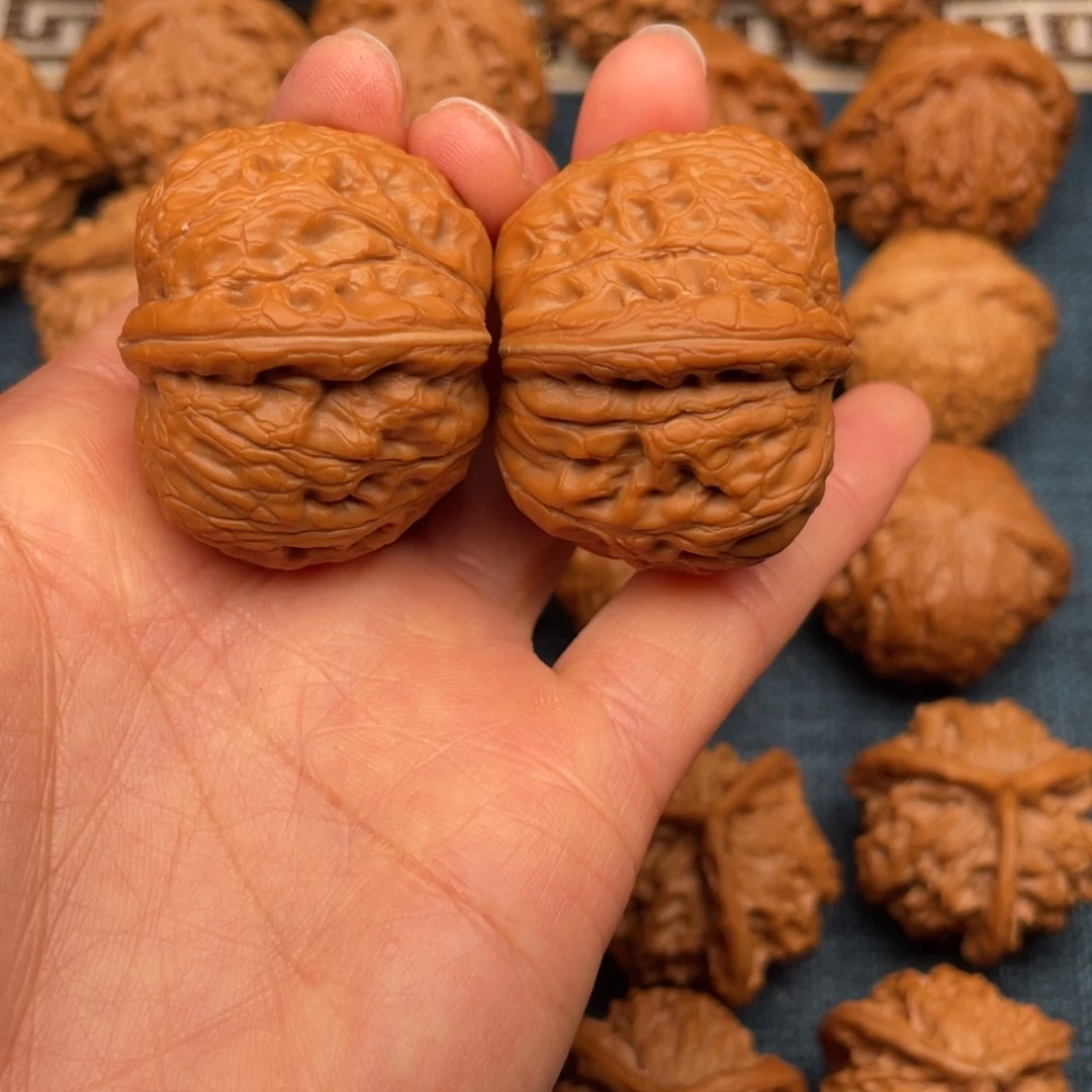 文玩核桃把件40全品毕业翘尖元宝