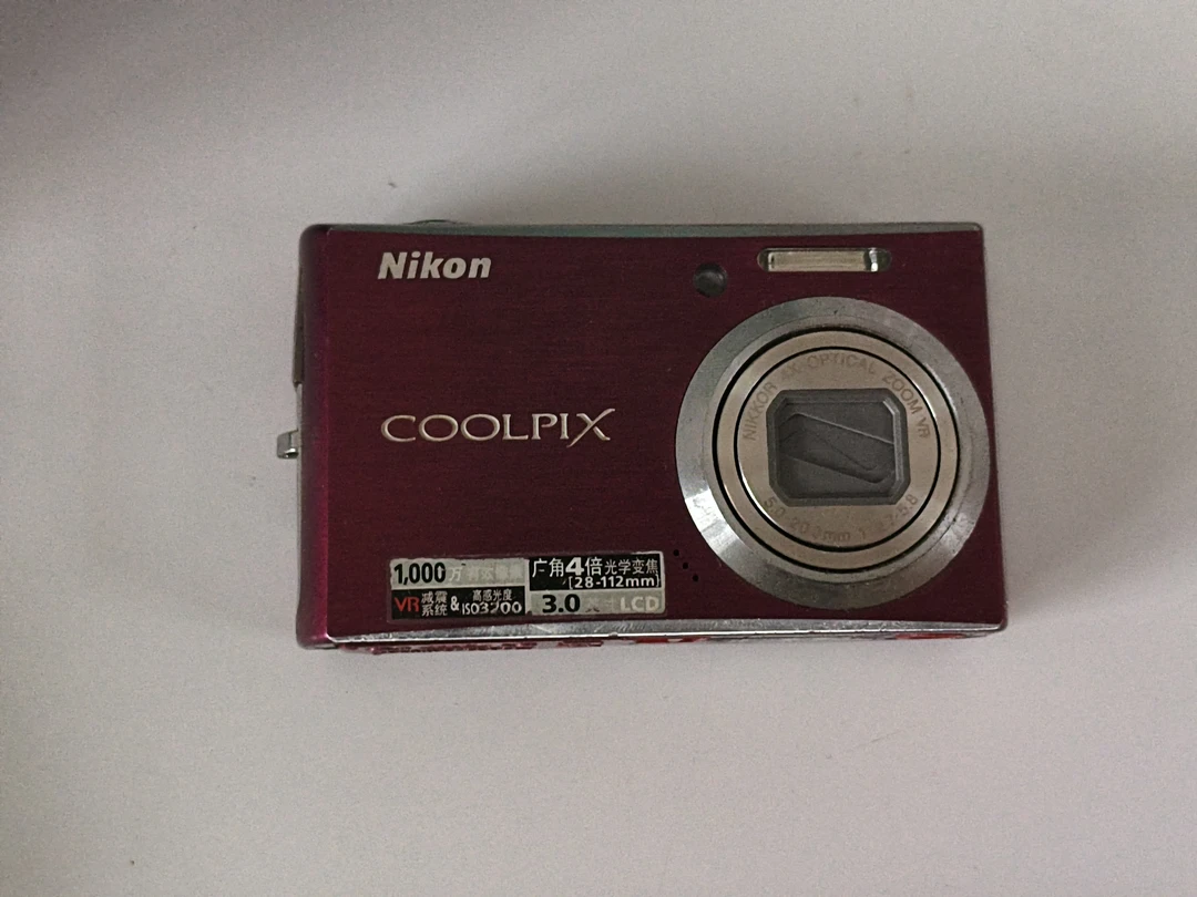 9新 Nikon/尼康 9新尼康是610小瑕疵机按键有一个按不动