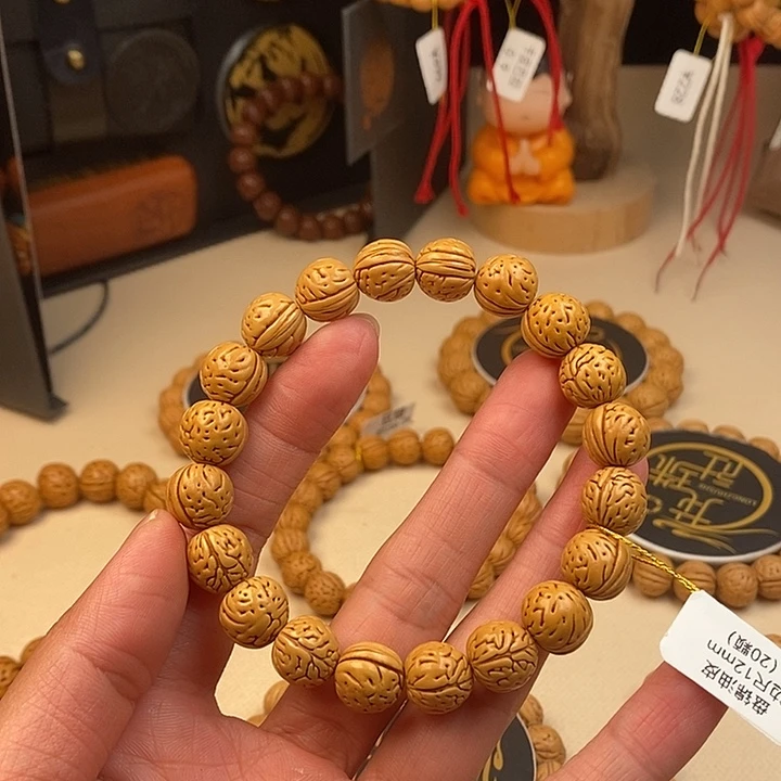 慶***平手串桃核盘锦油皮12 抛光