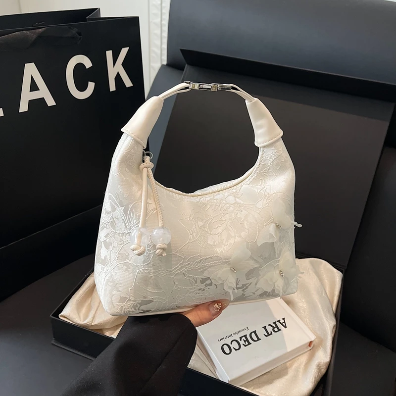 新中式国风包包女款2025新款潮流行时尚超火手拎包休闲单肩斜挎包