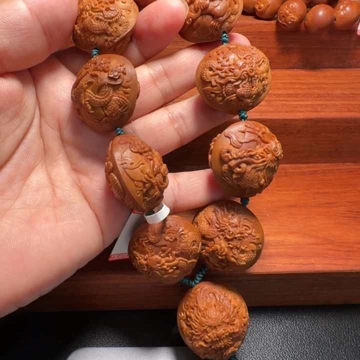 橄榄核吊坠龙生九子