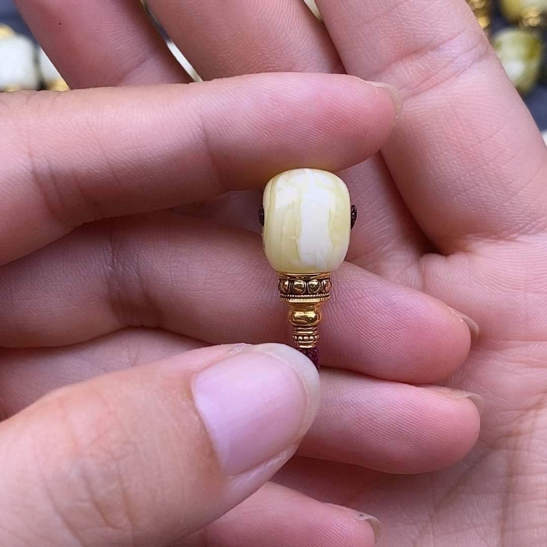 沐***霖裸石琥珀18K金镶嵌11mm 蜜蜡三通