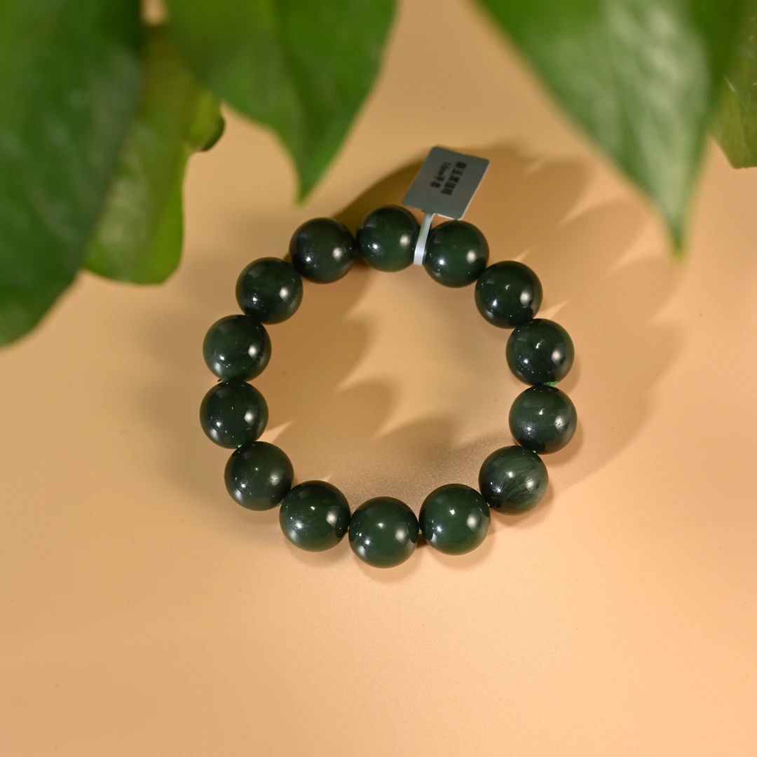 LOT8829 2511170122和田玉碧玉黑猫眼手串/保利