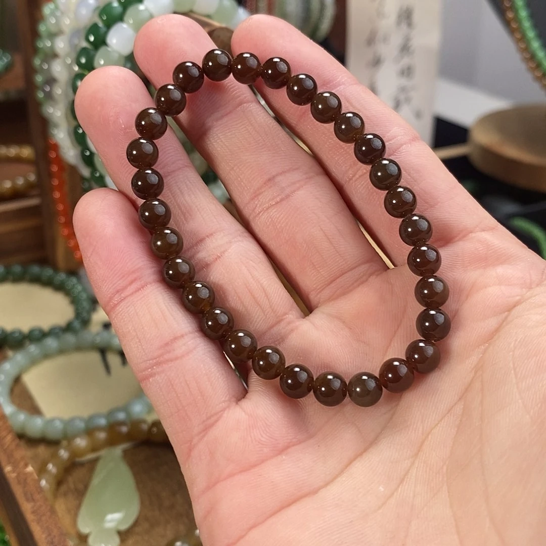 和田玉手串未镶嵌樱*?老红糖单圈有棉点