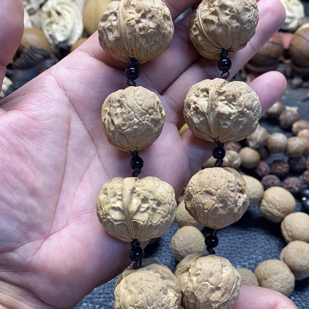 吊坠橄榄核蟒皮纹铁核桃手持