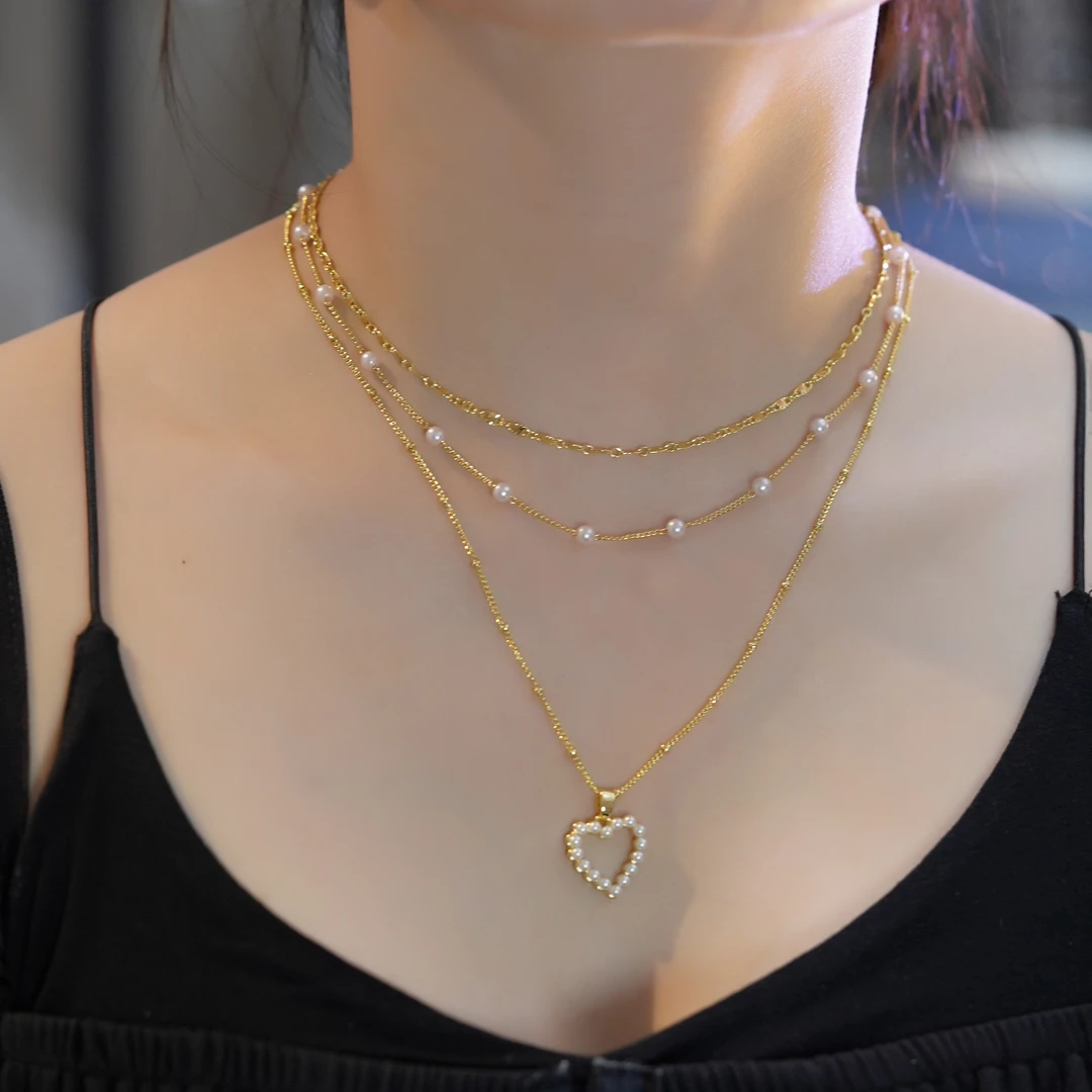 钛钢仿珍珠项链 轻奢时尚百搭爱心叠戴设计感三件套项链