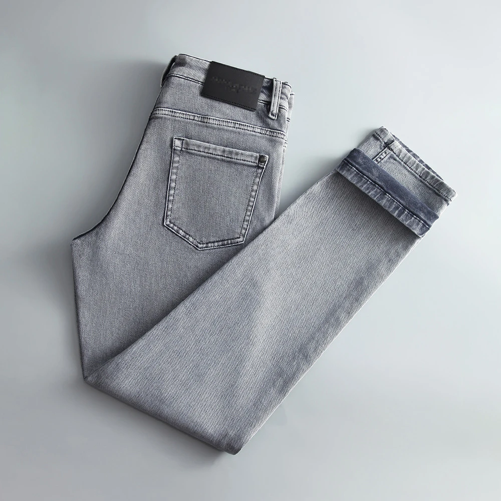 高档时尚男士牛仔裤雾霾蓝潮流水洗修身小直筒春夏休闲百搭长裤