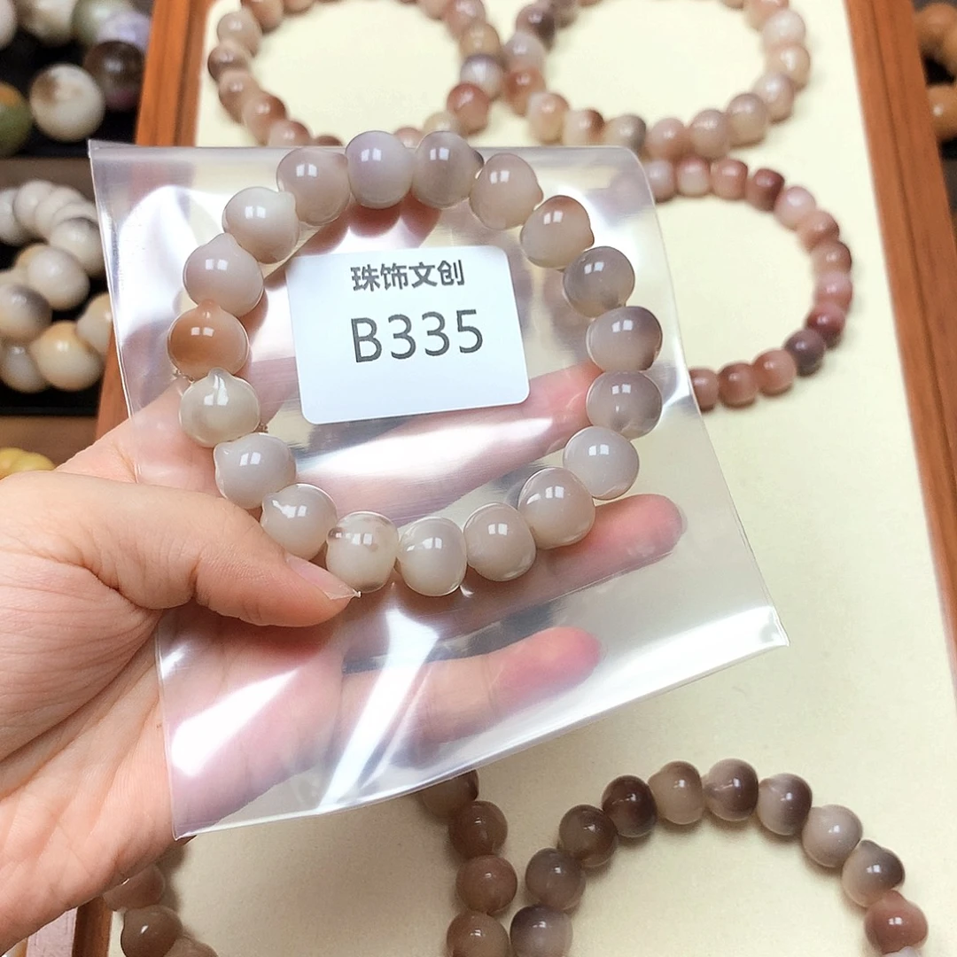 钱***李吊坠菩提根/象牙果B335