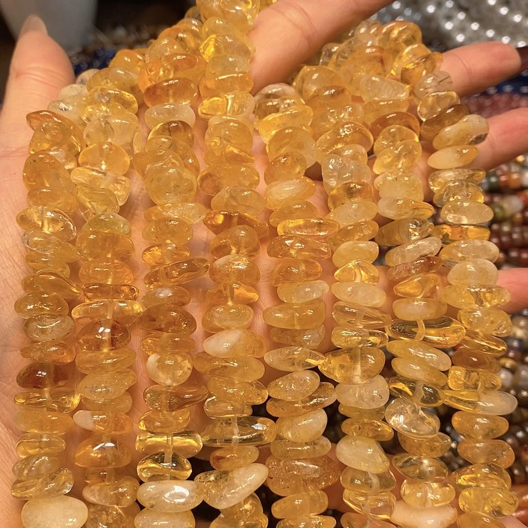 玛瑙/玉髓未镶嵌珠宝半成品天然黄塔晶中孔一条随型