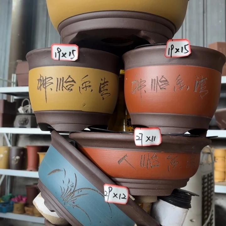 紫砂花盆100-6。