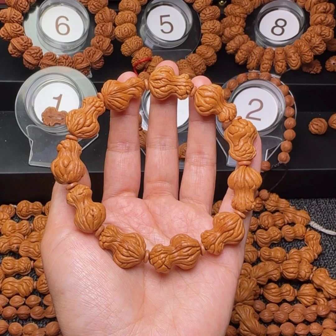 聽***风桃核吊坠秦岭花生