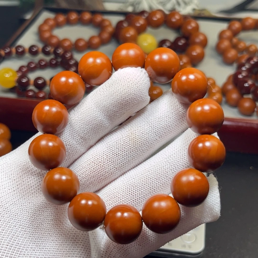 蒋****吊坠橄榄核1.59+树王全品铁核 小孔 微瑕