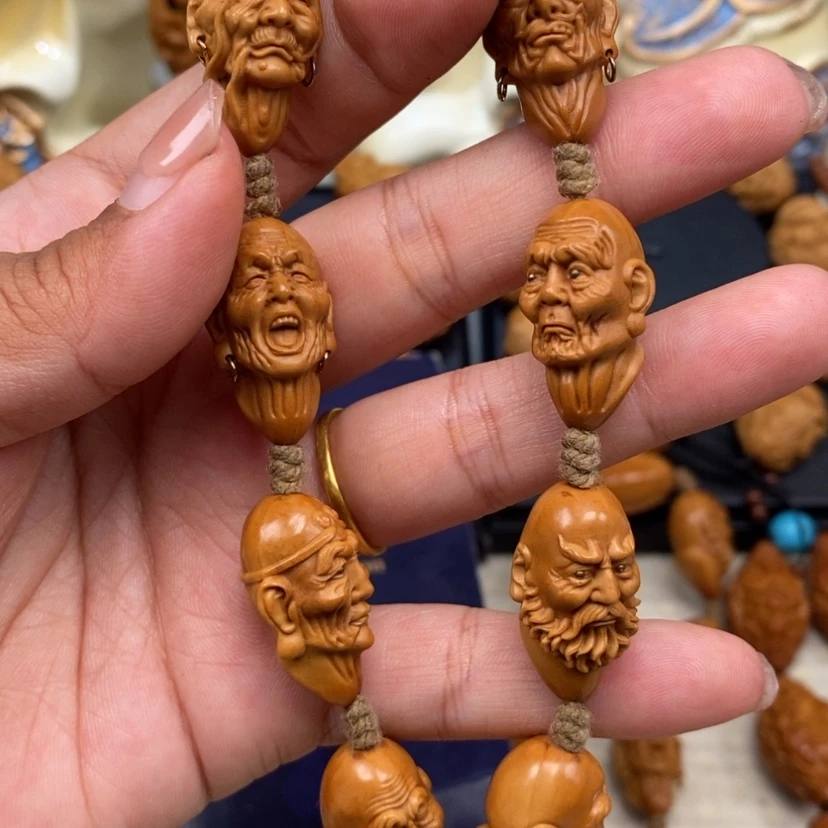 【闪购商品】橄榄核吊坠B****哥橄榄手工雕刻工艺