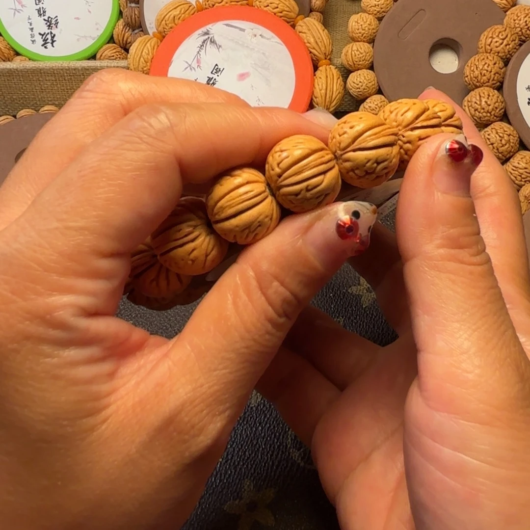 桃核手串肉纹元宝17